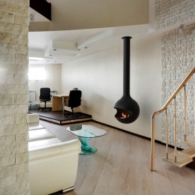 Hall of a private house with a hanging fireplace