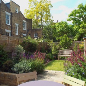 A small bench deep in the garden