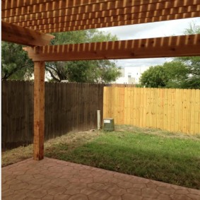 Wooden pergola on a paved area
