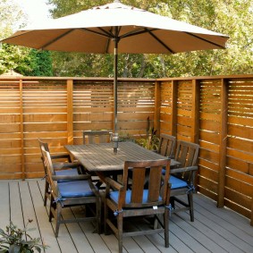 Dining group in the garden on the plank