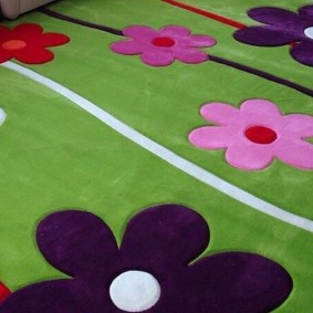 Drawings of flowers on a green carpet