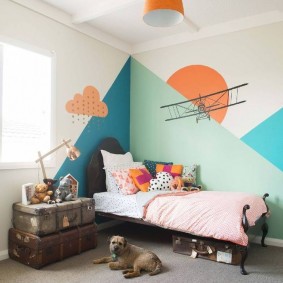 Geometric patterns of paint on a nursery wall