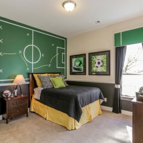 soccer field on the wall of a room for a boy