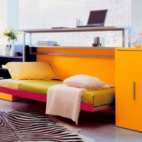 Bright furniture with a folding bed