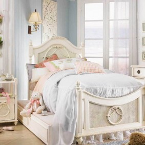 Stylish bed for a girl of school age