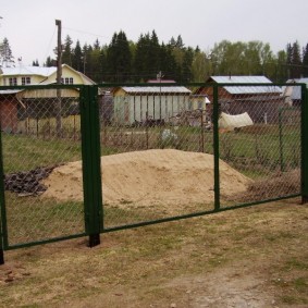 Wire mesh gates on the frame