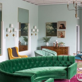 Curved green sofa