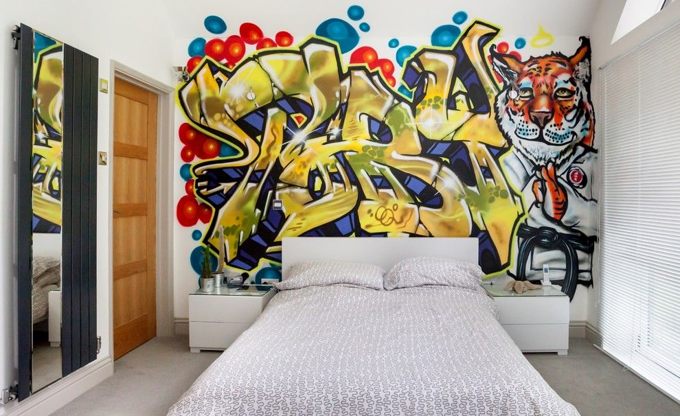 Graffiti over the bed of a teenage girl