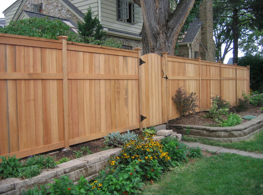 New wooden fence in front of a private house