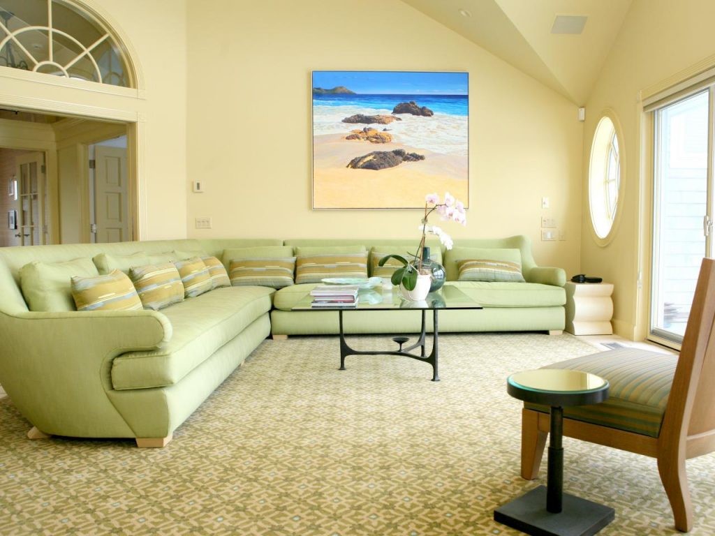 Bright living room with light green sofa