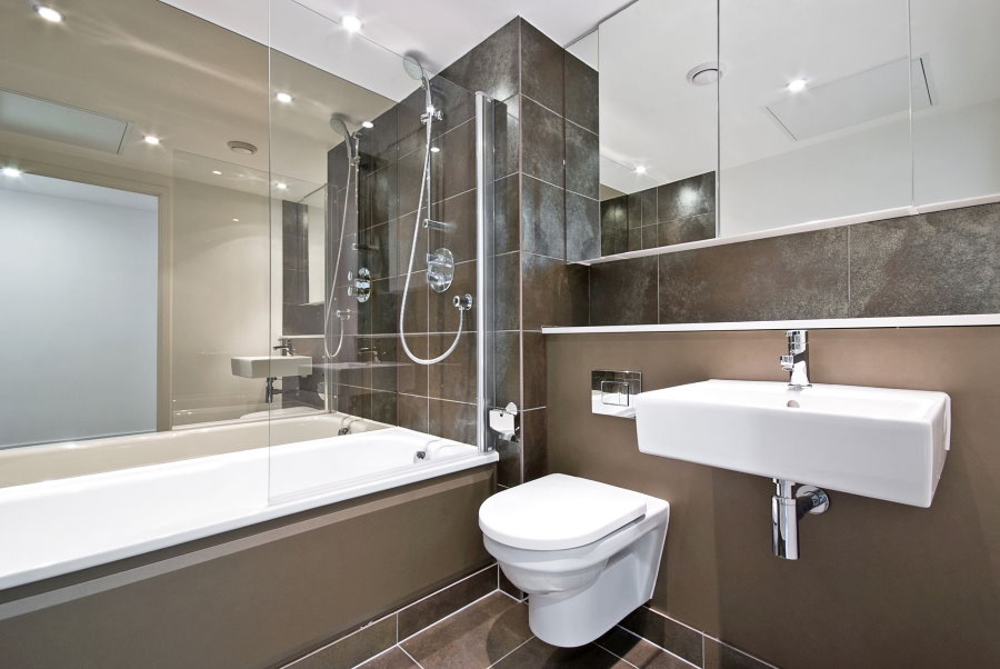 Mirror wall in the bathroom with toilet