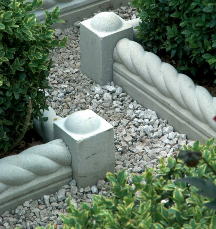 Concrete curbs in garden beds