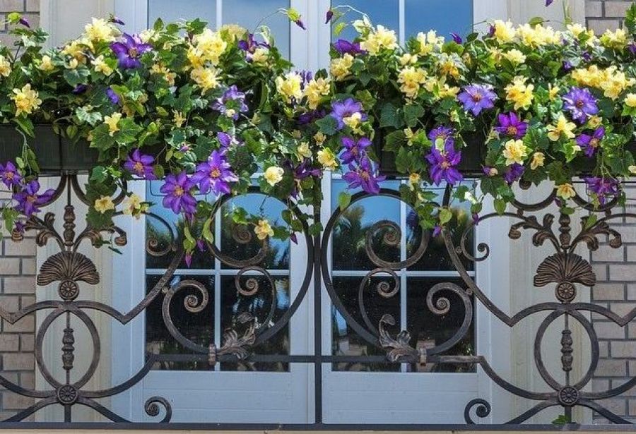 Decorating the balcony railing with fresh flowers