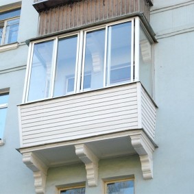 Plastic windows on the balcony of the apartment
