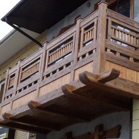 Wooden railing on the balcony of a rural house