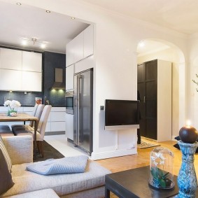 Design av ett kök-vardagsrum i en två-rums lägenhet