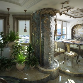 Indoor-Garten mit dekorativen Wasserfall an der Wand