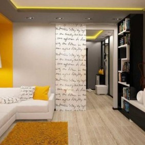 Yellow accents in the interior of the apartment hall