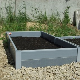 Fertile soil in a rectangular bed of plastic